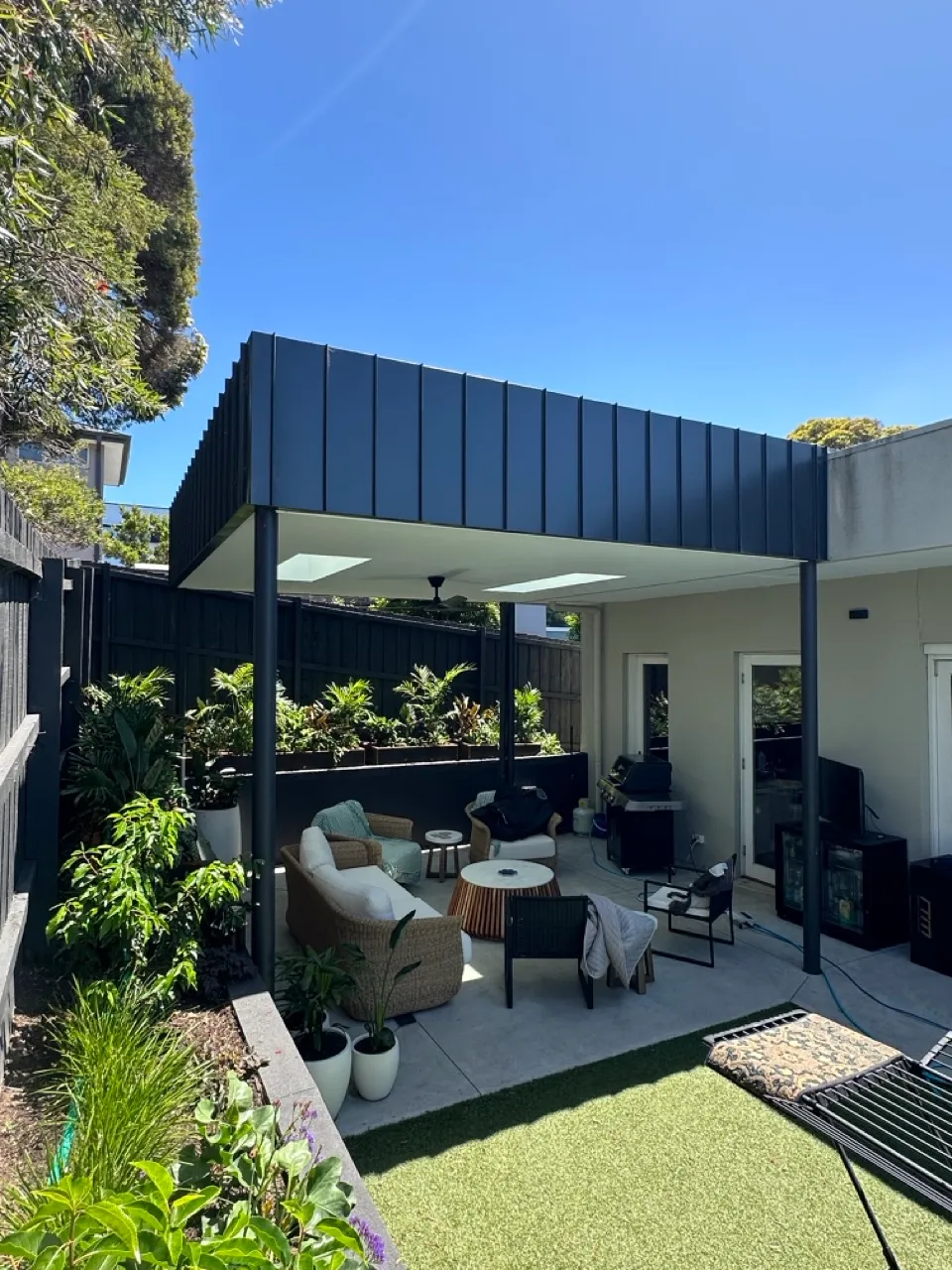Finished outdoor pavilion with covered alfresco entertaining area