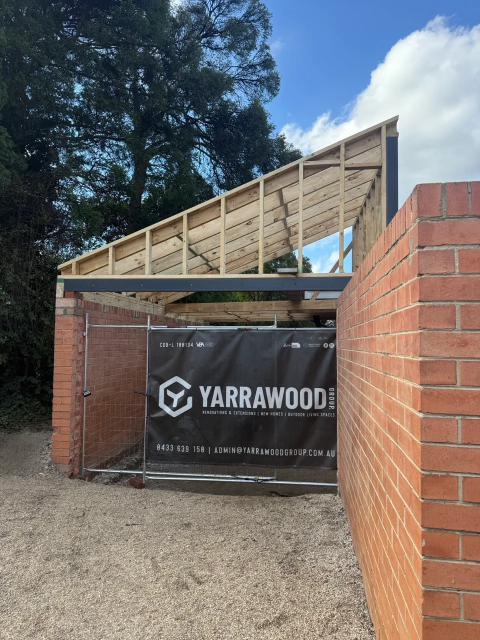 Architectural carport framing on site
