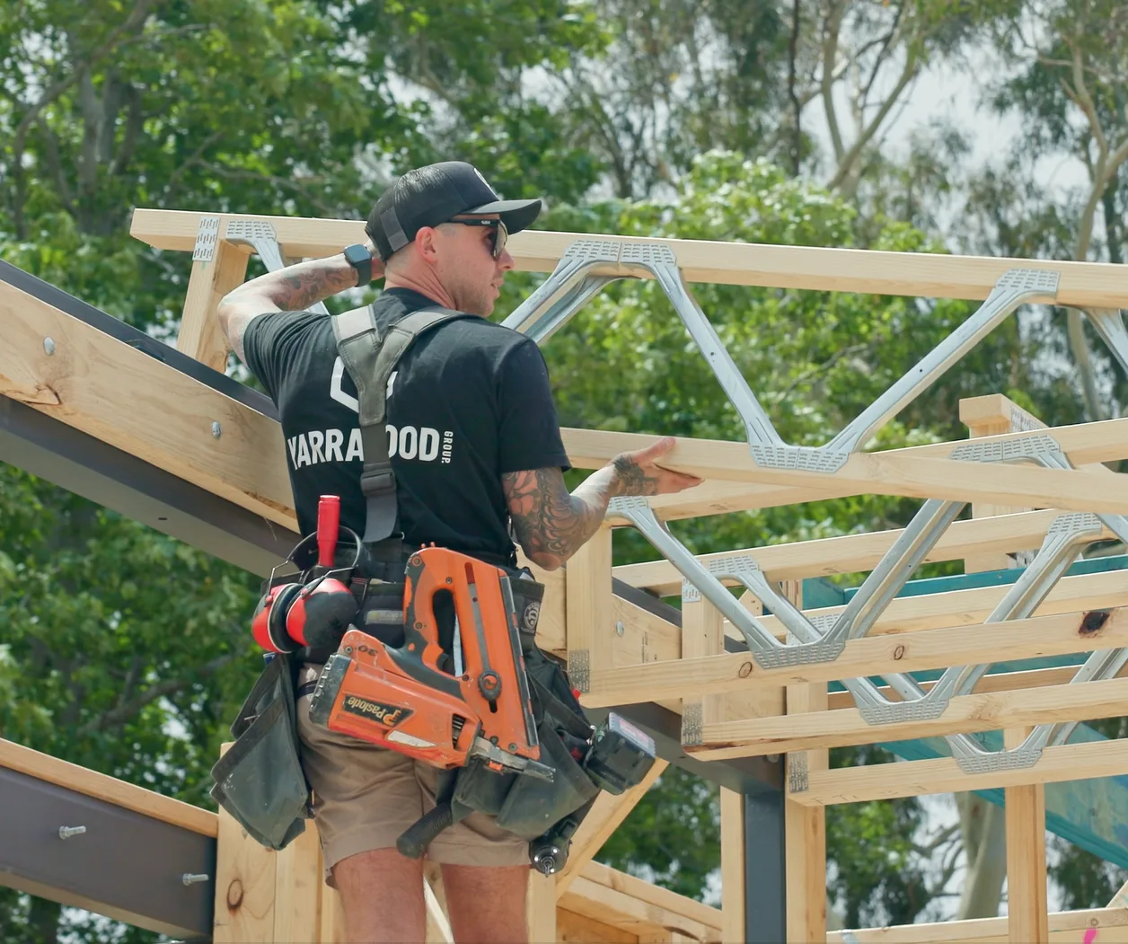 Yarrawood carpenter working on roof trusses